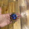 Rolex Submariner en tono dorado con bisel Pepsi azul 1